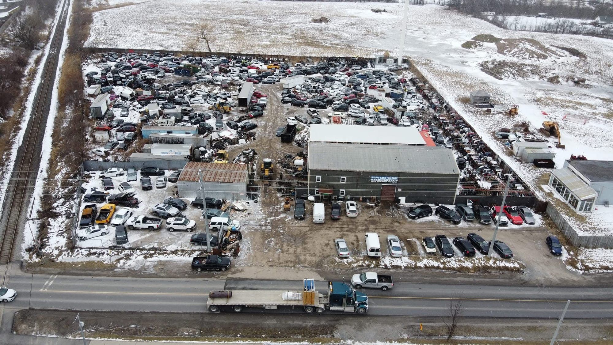 Aerial view of the Royal Auto Parts yard on Kalar Road, Niagara Falls, filled with hundreds of vehicles